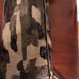 Brand new Stella and Dot camo clutch.